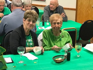 Cathy Milstead (l) and Dottie Hoffman were dressed for the St. Patrick's dinner and enjoying their friendship and that of other VFW Calabash Post 7288 members March 17th.